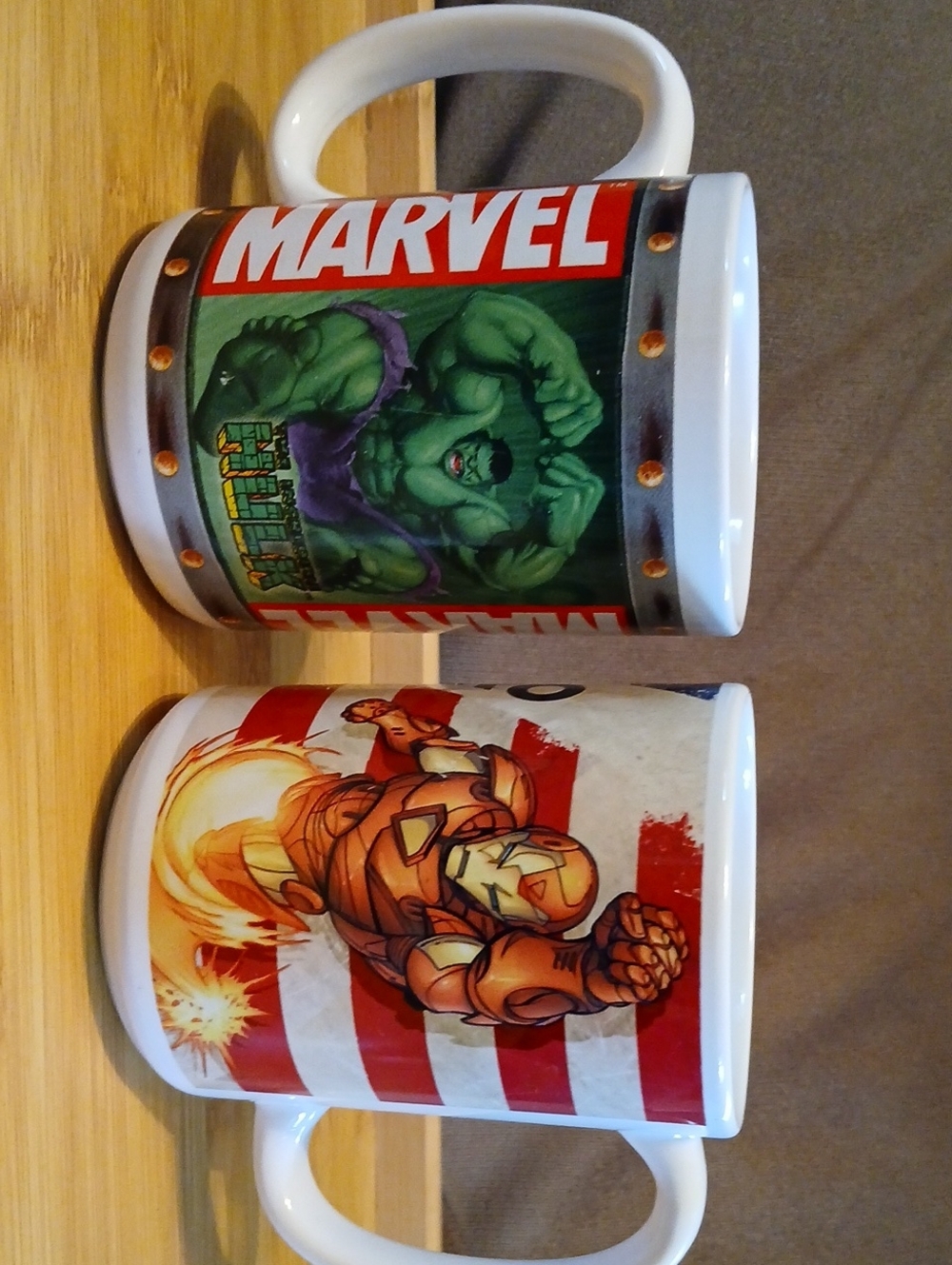 Marvel Ceramic Mug Duo — White with Green and Red and Red and Gold Artwork